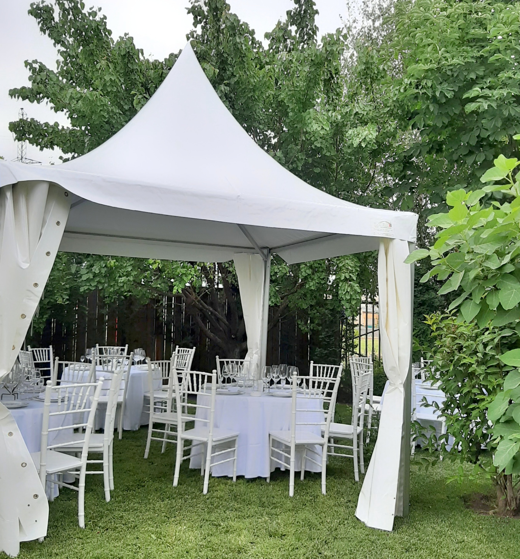 Garden pagoda tent with Chiavari chairs